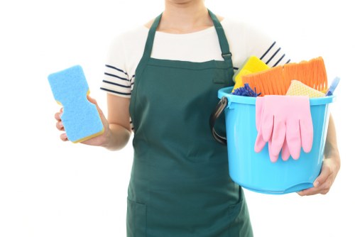 Office cleaning team preparing a commercial workspace in SE10